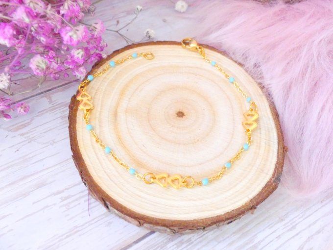 Bracelet double coeur en acier doré et chaîne émaillée bleu